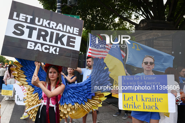 Ukrainians and supporters attend solidarity with Ukraine demonstration in front of the Washington Monument during the 75th NATO Summit in Wa...