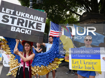 Ukrainians and supporters attend solidarity with Ukraine demonstration in front of the Washington Monument during the 75th NATO Summit in Wa...