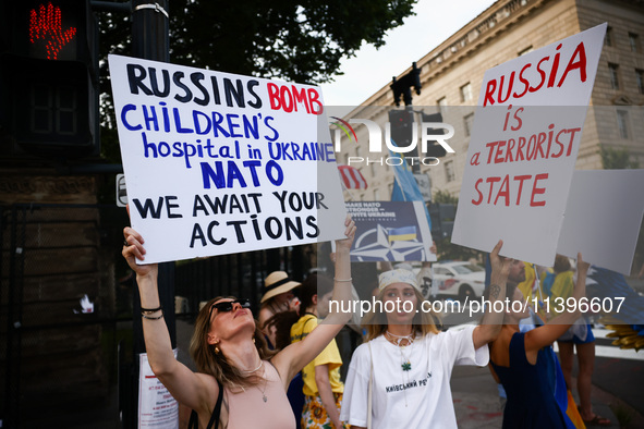 Ukrainians and supporters attend solidarity with Ukraine demonstration in front of the Washington Monument during the 75th NATO Summit in Wa...