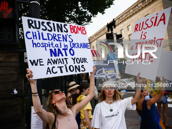 Ukrainians and supporters attend solidarity with Ukraine demonstration in front of the Washington Monument during the 75th NATO Summit in Wa...