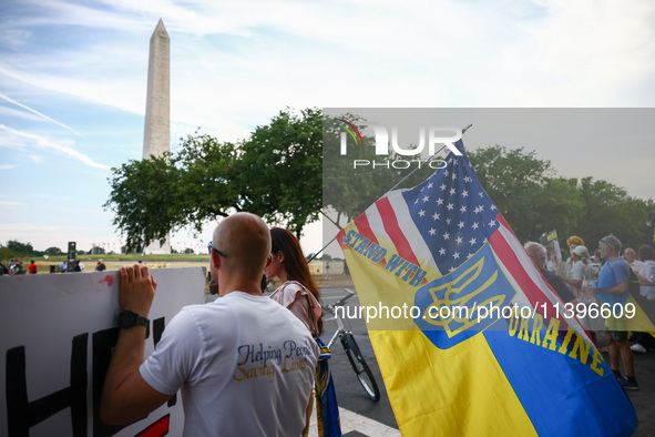 Ukrainians and supporters attend solidarity with Ukraine demonstration in front of the Washington Monument during the 75th NATO Summit in Wa...