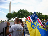 Ukrainians and supporters attend solidarity with Ukraine demonstration in front of the Washington Monument during the 75th NATO Summit in Wa...