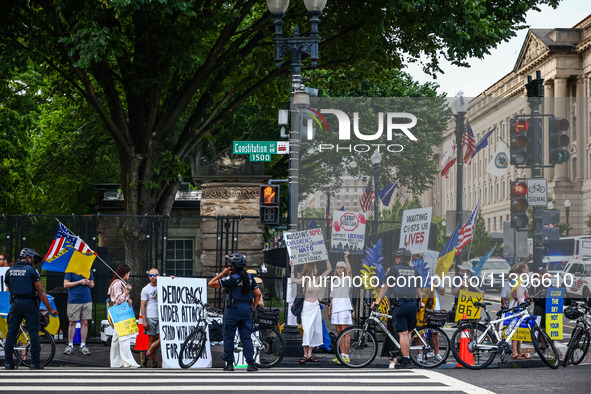 Ukrainians and supporters attend solidarity with Ukraine demonstration in front of the Washington Monument during the 75th NATO Summit in Wa...