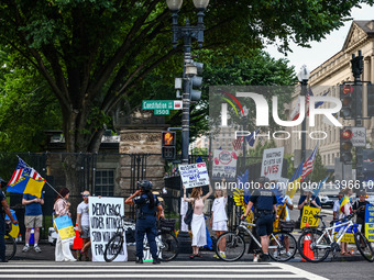 Ukrainians and supporters attend solidarity with Ukraine demonstration in front of the Washington Monument during the 75th NATO Summit in Wa...