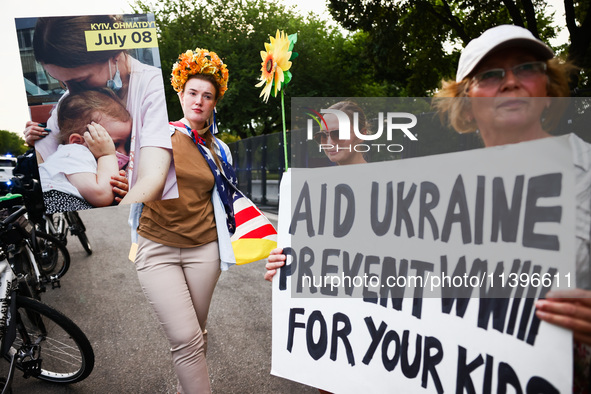 Ukrainians and supporters attend solidarity with Ukraine demonstration in front of the Washington Monument during the 75th NATO Summit in Wa...