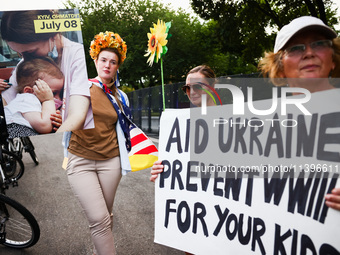 Ukrainians and supporters attend solidarity with Ukraine demonstration in front of the Washington Monument during the 75th NATO Summit in Wa...