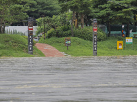 The road connecting the village is being cut off due to the flood caused by the heavy rain last night at Hoeryongpo village in Yecheon, Sout...