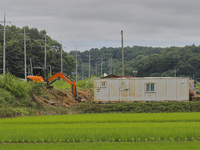 They are repairing the damaged levee that collapsed due to the heavy rain last night at Gaepo-Myeon in Yecheon, South Korea, in Sangju, Sout...