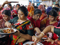 Hindu devotees are gathering beside the river Buriganga to float their lamps just after Bipodnashini Puja in Dhaka, Bangladesh, on July 09,...