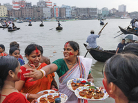 Hindu devotees are gathering beside the river Buriganga to float their lamps just after Bipodnashini Puja in Dhaka, Bangladesh, on July 09,...