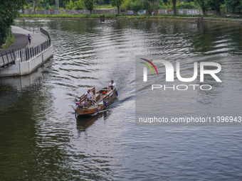 A boat is going on the Brda River in Bydgoszcz, Poland, on May 30, 2024 (