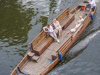 Two pairs of tourists are going on a travel boat by the Brda River in Bydgoszcz, Poland, on May 30, 2024 (