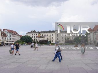 A general view of the old town square with open-air restaurants is being seen in Bydgoszcz, Poland, on May 30, 2024. (