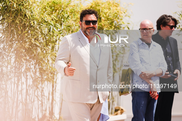 Denis Menochet is arriving at the photocall of Rumours during the 77th Festival de Cannes in Cannes, France, on May 19, 2024 