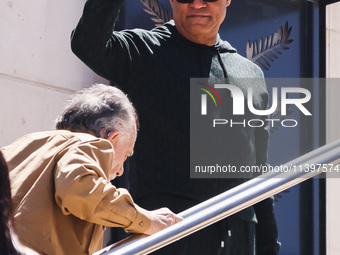 Laurence Fishburne is arriving at the photocall of Megalopolis during the 77th Festival de Cannes in Cannes, France, on May 17, 2024 (