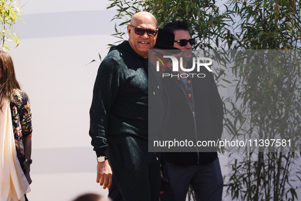 Laurence Fishburne is arriving at the photocall of Megalopolis during the 77th Festival de Cannes in Cannes, France, on May 17, 2024 