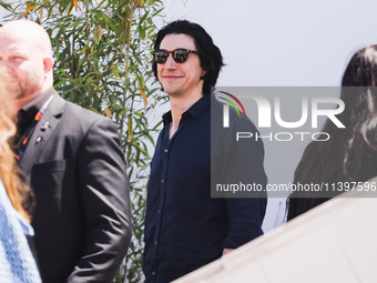 Adam Driver is arriving at the photocall of Megalopolis during the 77th Festival de Cannes in Cannes, France, on May 17, 2024 (