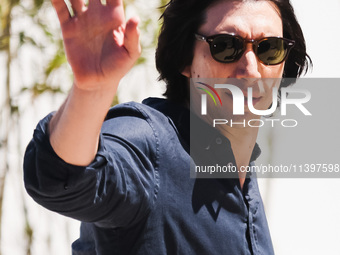 Adam Driver is arriving at the photocall of Megalopolis during the 77th Festival de Cannes in Cannes, France, on May 17, 2024 (