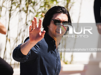 Adam Driver is arriving at the photocall of Megalopolis during the 77th Festival de Cannes in Cannes, France, on May 17, 2024 (