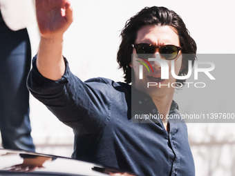 Adam Driver is arriving at the photocall of Megalopolis during the 77th Festival de Cannes in Cannes, France, on May 17, 2024 (