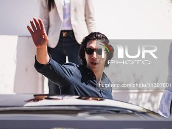 Adam Driver is arriving at the photocall of Megalopolis during the 77th Festival de Cannes in Cannes, France, on May 17, 2024 (