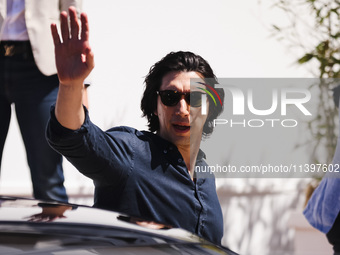 Adam Driver is arriving at the photocall of Megalopolis during the 77th Festival de Cannes in Cannes, France, on May 17, 2024 (