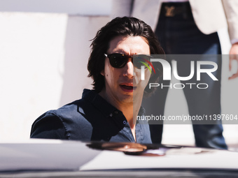 Adam Driver is arriving at the photocall of Megalopolis during the 77th Festival de Cannes in Cannes, France, on May 17, 2024 (