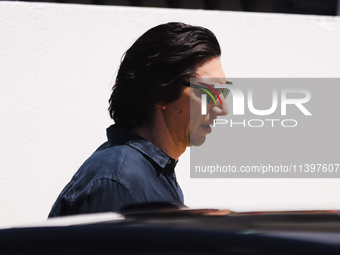 Adam Driver is arriving at the photocall of Megalopolis during the 77th Festival de Cannes in Cannes, France, on May 17, 2024 (