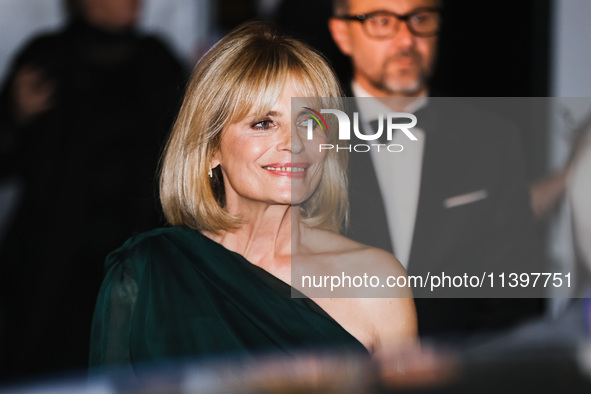 Isabella Ferrari is leaving the hotel for the red carpet of Parthenope during the 77th Festival de Cannes in Cannes, France, on May 21, 2024...