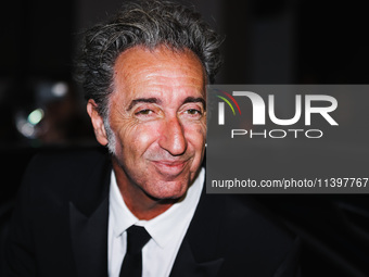 Paolo Sorrentino is leaving the hotel for the red carpet of Parthenope during the 77th Festival de Cannes in Cannes, France, on May 21, 2024...