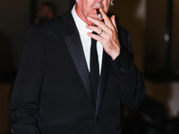 Paolo Sorrentino is leaving the hotel for the red carpet of Parthenope during the 77th Festival de Cannes in Cannes, France, on May 21, 2024...