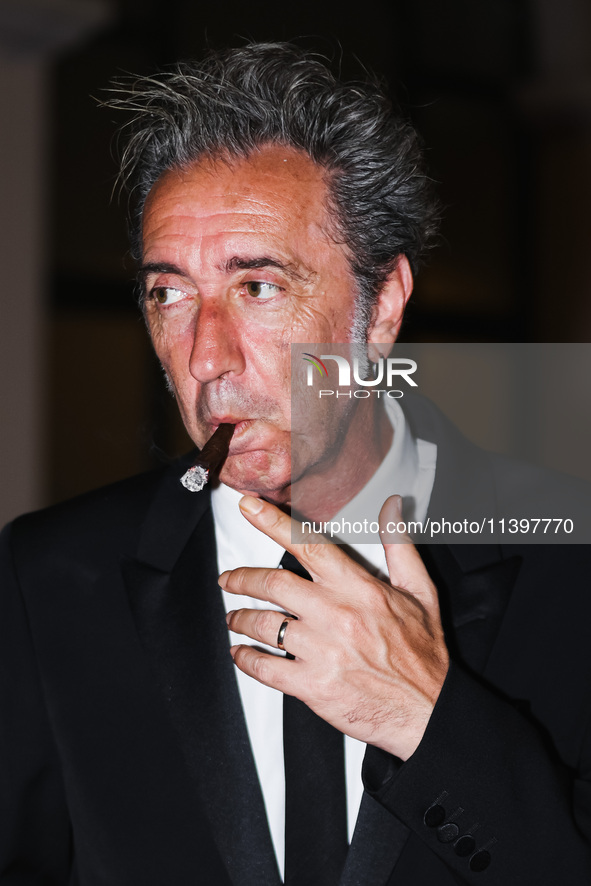 Paolo Sorrentino is leaving the hotel for the red carpet of Parthenope during the 77th Festival de Cannes in Cannes, France, on May 21, 2024...