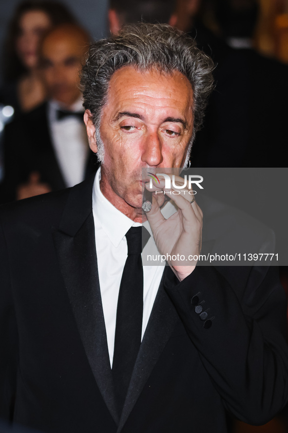 Paolo Sorrentino is leaving the hotel for the red carpet of Parthenope during the 77th Festival de Cannes in Cannes, France, on May 21, 2024...