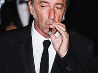 Paolo Sorrentino is leaving the hotel for the red carpet of Parthenope during the 77th Festival de Cannes in Cannes, France, on May 21, 2024...