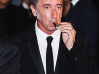 Paolo Sorrentino is leaving the hotel for the red carpet of Parthenope during the 77th Festival de Cannes in Cannes, France, on May 21, 2024...