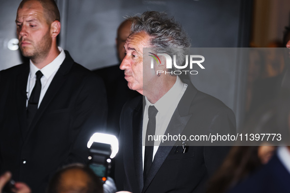 Paolo Sorrentino is leaving the hotel for the red carpet of Parthenope during the 77th Festival de Cannes in Cannes, France, on May 21, 2024...