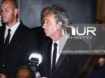 Paolo Sorrentino is leaving the hotel for the red carpet of Parthenope during the 77th Festival de Cannes in Cannes, France, on May 21, 2024...