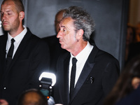 Paolo Sorrentino is leaving the hotel for the red carpet of Parthenope during the 77th Festival de Cannes in Cannes, France, on May 21, 2024...