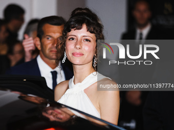 Celeste Dalla Porta is leaving the hotel for the red carpet of Parthenope during the 77th Festival de Cannes in Cannes, France, on May 21, 2...