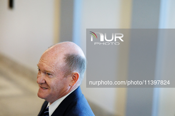 U.S. Senator Chris Coons (D-DE) departs a meeting between a bipartisan group of U.S. Senators and leaders from NATO on Capitol Hill in Washi...