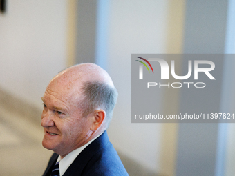 U.S. Senator Chris Coons (D-DE) departs a meeting between a bipartisan group of U.S. Senators and leaders from NATO on Capitol Hill in Washi...