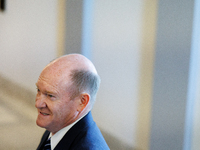 U.S. Senator Chris Coons (D-DE) departs a meeting between a bipartisan group of U.S. Senators and leaders from NATO on Capitol Hill in Washi...