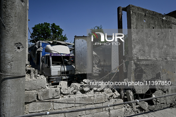 Trucks are being damaged by the July 8 Russian missile attack in Vilniansk, Zaporizhzhia region, southeastern Ukraine, on July 9, 2024. NO U...