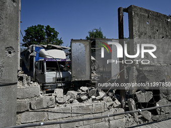 Trucks are being damaged by the July 8 Russian missile attack in Vilniansk, Zaporizhzhia region, southeastern Ukraine, on July 9, 2024. NO U...