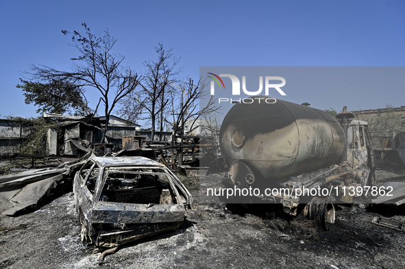 Burnt-out cars are being pictured after the July 8 Russian missile attack in Vilniansk, Ukraine, on July 9, 2024. NO USE RUSSIA. NO USE BELA...