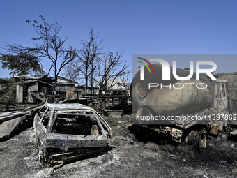 Burnt-out cars are being pictured after the July 8 Russian missile attack in Vilniansk, Ukraine, on July 9, 2024. NO USE RUSSIA. NO USE BELA...