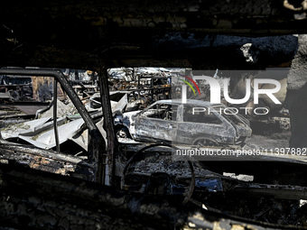 Burnt-out cars are being pictured after the July 8 Russian missile attack in Vilniansk, Ukraine, on July 9, 2024. NO USE RUSSIA. NO USE BELA...