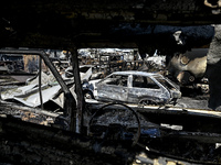 Burnt-out cars are being pictured after the July 8 Russian missile attack in Vilniansk, Ukraine, on July 9, 2024. NO USE RUSSIA. NO USE BELA...