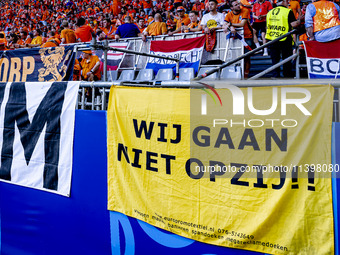 A banner reading ''Wij gaan niet opzij'' is being displayed during the match between the Netherlands and England at the BVB Stadion Dortmund...