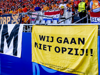 A banner reading ''Wij gaan niet opzij'' is being displayed during the match between the Netherlands and England at the BVB Stadion Dortmund...